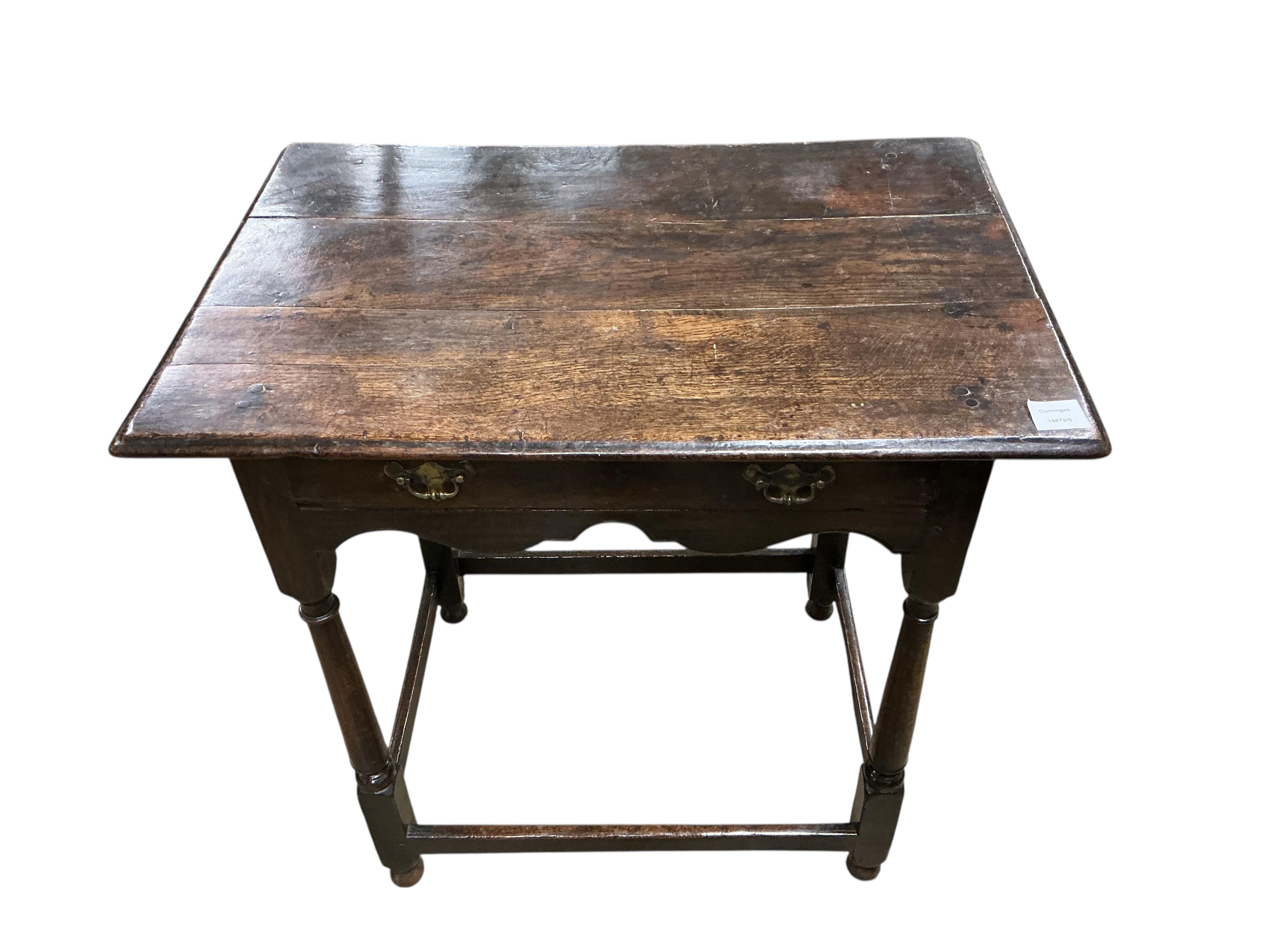 An early 18th century oak side table, fitted with a single long drawer, width 74cm, depth 49cm, height 74cm
